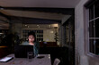 © Wavebreak Media - Asian businesswoman sitting at desk and using laptop, working late at office