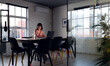 © Wavebreak Media - Asian businesswoman sitting at desk and using laptop, working late at office