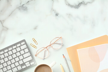 Wall Mural - Flat lay office desk table with stationery and female accessories. Top view stylish workspace.