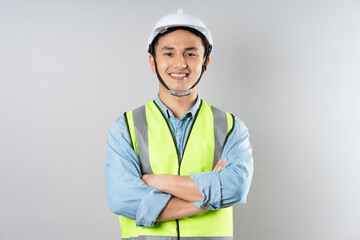 Wall Mural - Asian engineer portrait on gray background