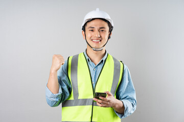 Wall Mural - Asian engineer portrait on gray background