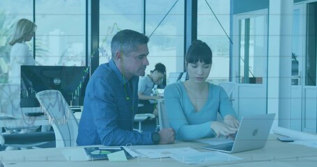 Poster - Animation of financial data processing over diverse man and woman discussing over a laptop at office