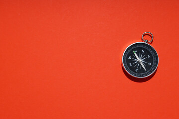 traveling, adventure and vacation concept with compass