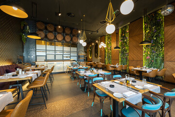 Interior of a luxury restaurant with flower decorated walls