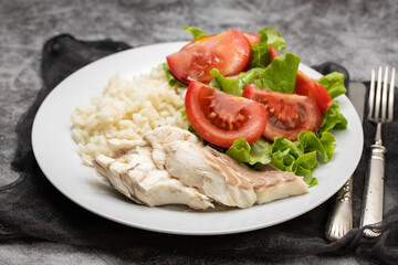 Sticker - boiled fresh fish with boiled rice and fresh salad