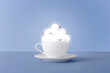 © ADDICTIVE STOCK - Ceramic cup with bunch of light bulbs