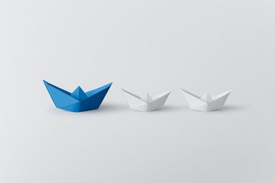 Set of colorful origami ships on white background