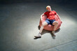 © Caia Image - Portrait cool young man relaxing on bean bag chair
