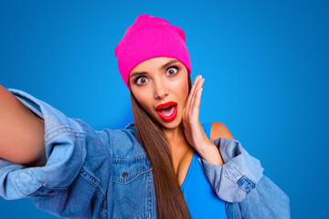 Poster - Emotion facial expressing charm oops people person concept. Close up photo portrait of beautiful pretty nice cheerful fun joy lady vlogger making taking selfie isolated on pastel bright background