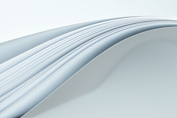 Several curved sheets of paper on a white background