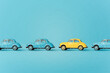 © ADDICTIVE STOCK - Colorful vintage cars on blue background