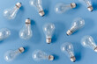 © ADDICTIVE STOCK - Collection of various light bulbs on blue background