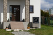 © Milan - Economic heat pump in modern passive house using green energy, future of heating concept