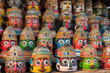 © chandlervid85 - Lots of painted wooden and clay idols of Tribal Hindu god Jagannath during Rath yatra. AI generative.