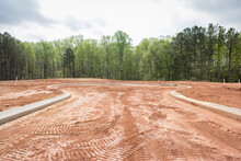 New Home Residential Subdivision Development Of Roads And Curbs