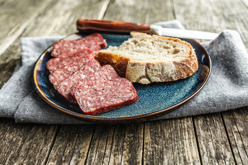 Wall Mural - Smoked .sausage. Sliced salami on plate.