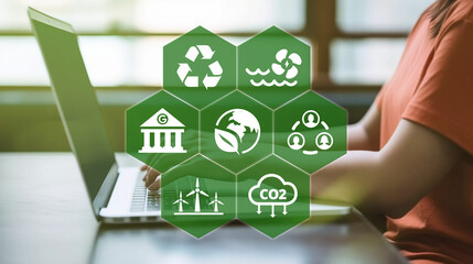 ESG concept for environmental, social, and governance in sustainable and ethical business and investment on the Network connection on a green background with a women and laptop. 