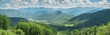 View of the mountain valley, summer greenery, sunny day, panoramic view
