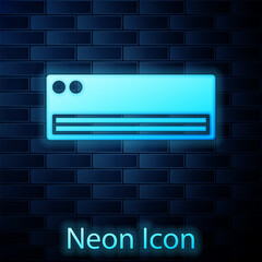 Sticker - Glowing neon Air conditioner icon isolated on brick wall background. Split system air conditioning. Cool and cold climate control system. Vector