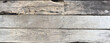© RocknRoller Studios - Gray Board Wallpaper with copy-space. Premium, Vintage Wooden Texture Banner.