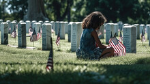 Little Girl Sitting On The Grass In A Cemetery And Looking At The American Flag, Generative AI
