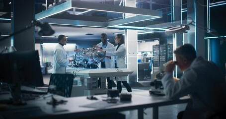Poster - Thrust Engine Engineer, Project Manager and Machinery Operator Work on a Futuristic Turbine Motor, Standing with Tablet Computer in Scientific Technology Lab. Professional Team Developing a Prototype