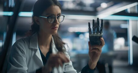 Poster - Young Scientist Working on a Bionic Robot Hand for People with Health Conditions or Impairments. Female Engineer Using a Screwdriver to Work on Humanoid AI Robot Component at a Startup Company