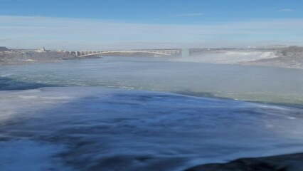 Wall Mural - HD of an amazing waterfall in winter city