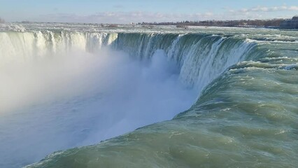 Wall Mural - HD of an amazing waterfall in winter city