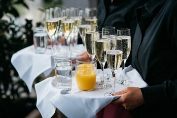 Sticker - Waiter serving champagne and juice