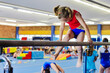 © Austockphoto - little girl at gymnastics