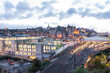 View of Waverley station with Edinburgh old town skyline at sunset, Scotland, United Kingdom.
