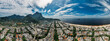 © robertharding - Aerial panoramic view of Pepe Beach and Pedra da Gavea in Barra da Tijuca district, an upscale neighborhood on the west side of Rio de Janeiro, Brazil, South Amereica