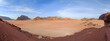 © robertharding - Wide panorama of the plain of Wadi Rum desert, Jordan, Middle East