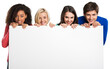 © BillionPhotos.com - Group of teens holding blank banner