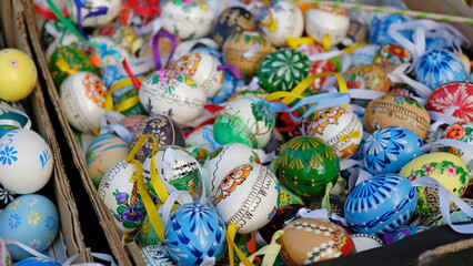 Wall Mural - Beautiful colorful decor for Easter. Traditional Easter painted colorful eggs. Selective focus.