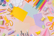 © igishevamaria - Pink pastel background with various colorful material for creativity and art activity.  Stationery and supplies for drawing and craft with .copy space.  Primary School or kindergarten.
