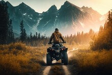 Person, Riding Atv Through The Forest, With View Of Majestic Mountain Range In The Background, Created With Generative Ai