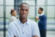 © Katsiaryna - African American business man with folded arms