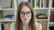 © Krakenimages.com - Young blonde woman student sitting with serious expression at university classroom