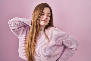 Sticker - Young caucasian woman standing over pink background suffering of neck ache injury, touching neck with hand, muscular pain