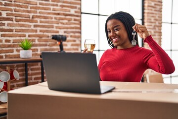 Sticker - Young african american with braids showing keys of new home doing video call smiling with a happy and cool smile on face. showing teeth.