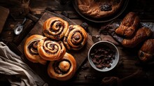 Freshly Baked Buns With Raisins And Chocolate On Wooden Background. Free Space, Flat Lay. Generative Ai