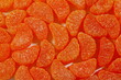 sweet orange flavored sugar candy texture seamless background,top view