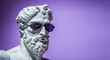 © Daria - Gypsum statue head in sunglasses on a purple background illustration