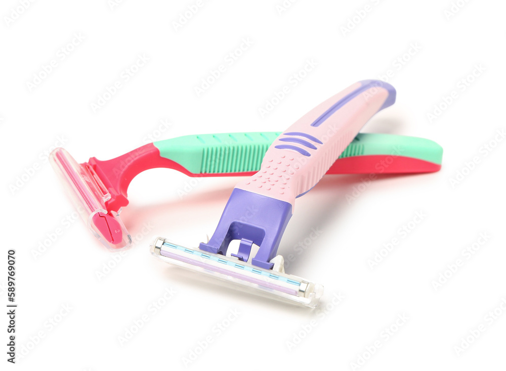 Two safety razors on white background