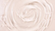 Cosmetic product texture, moisturizing lotion isolated on pink background, squeezed out and smeared portion of skincare cream product testing