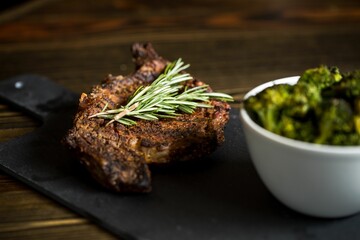 Sticker - Beef steak and bowl of broccolis on a board