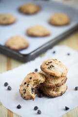 Sticker - Closeup shot of gluten-free cookies with chocolate put on the table on the blurred background