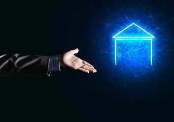 Conceptual image with hand pointing at house or main page icon on dark background